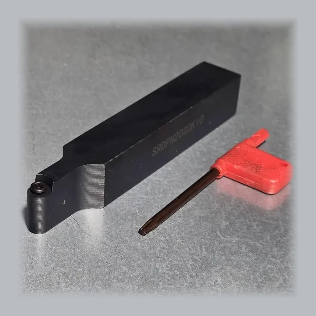 EHQ SRDPN2020K10 neutral round-insert external turning toolholder shown with a red-handled driver.